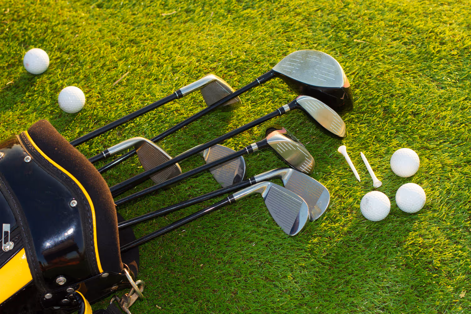 Golf bag with clubs, balls and tees