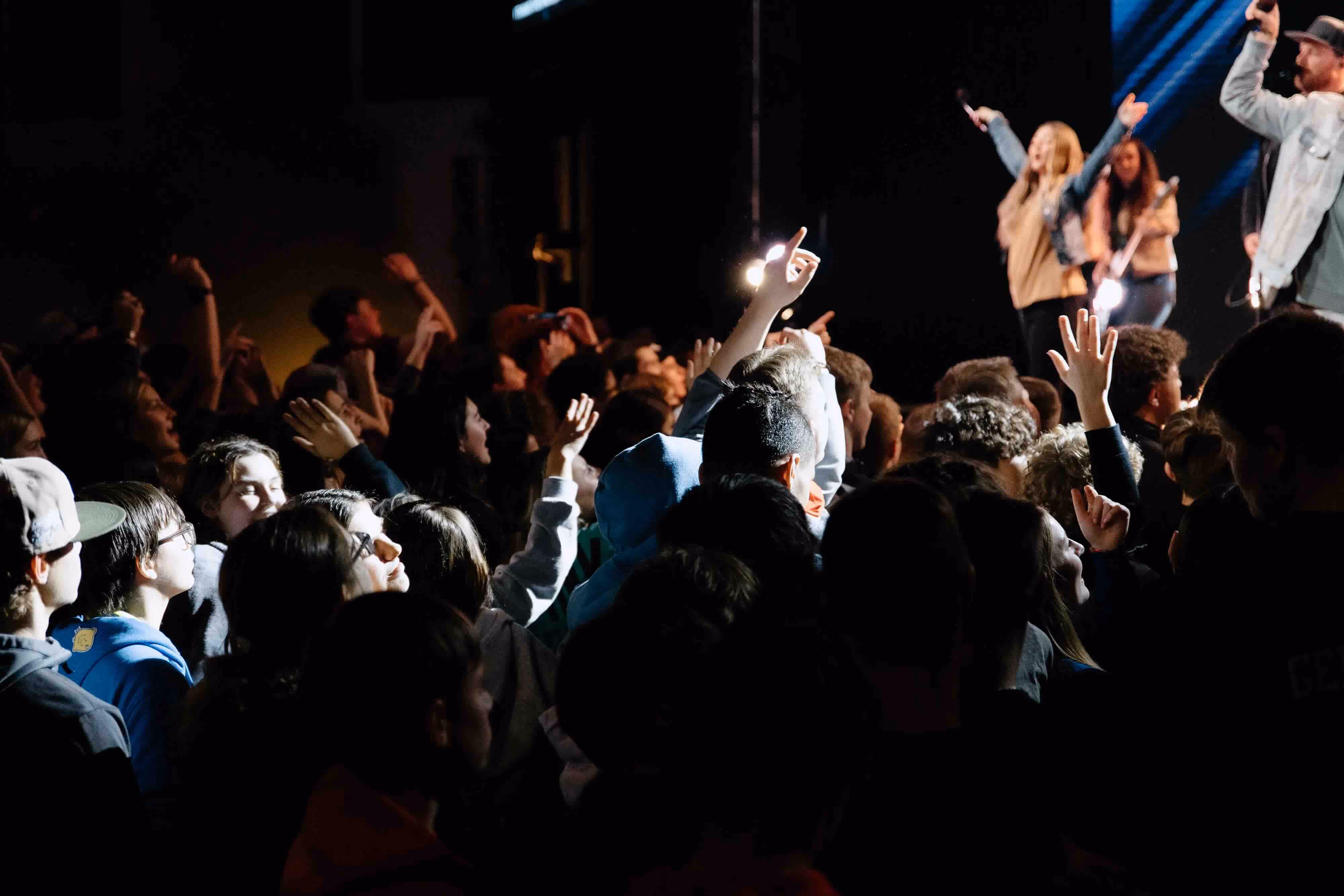 Students cheering a concert