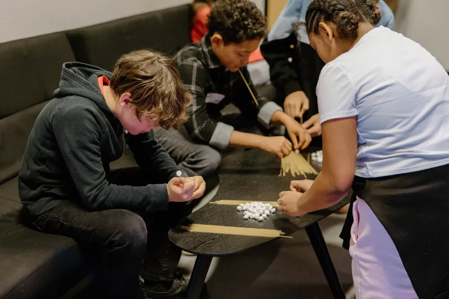 A group of students talking in a circle