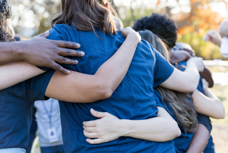  A community event hosted by a nonprofit, with people engaging and smiling