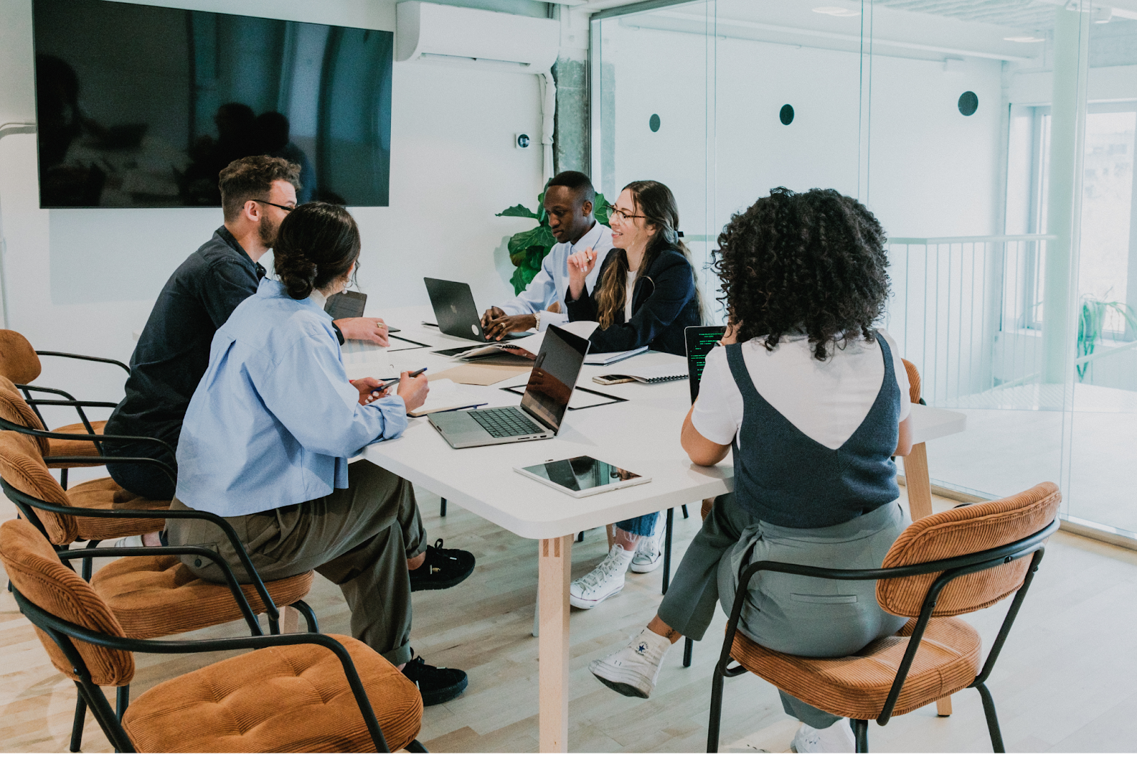 A nonprofit team meeting, discussing marketing strategies