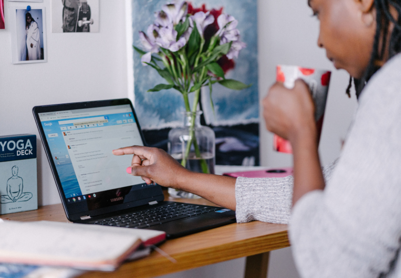 Nonprofit volunteer opening and reading email from nonprofit about a volunteer opportunity