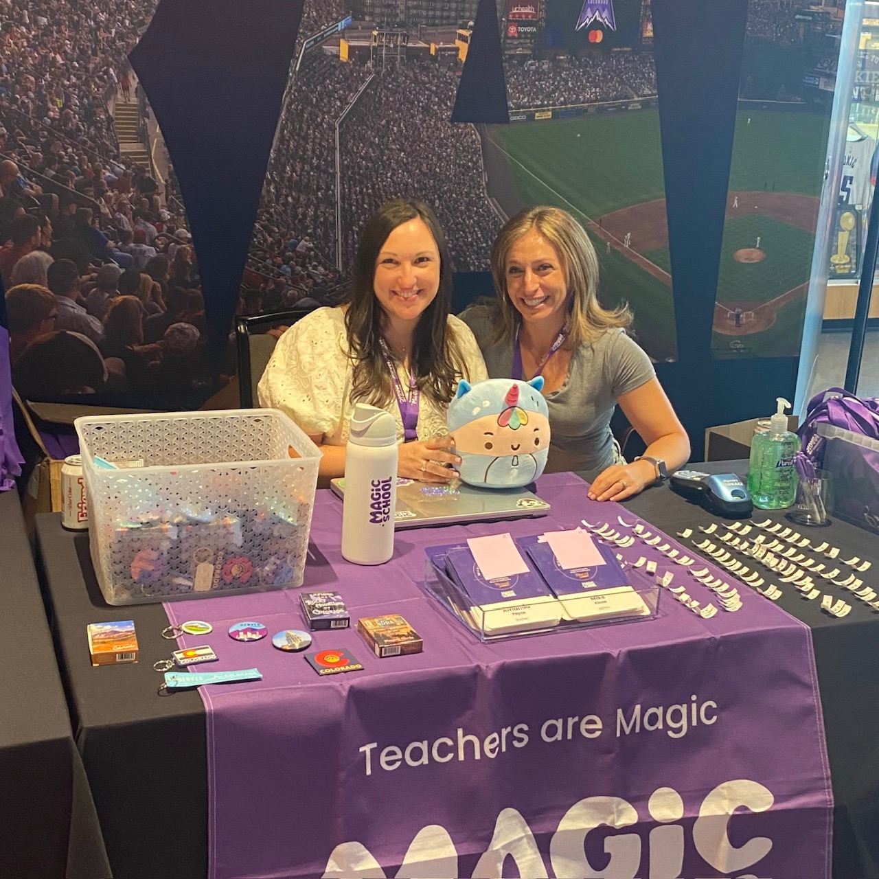 MagicSchool employees at a team retreat check-in booth