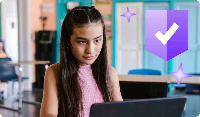 Student sitting in a classroom using a laptop, with a checkmark shield icon representing safe and approved technology.