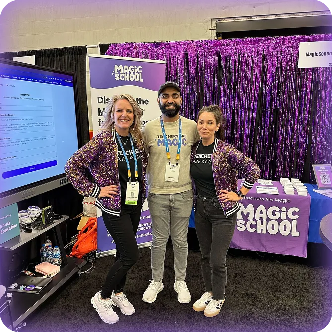 2 MagicSchool employees posing with MagicSchool Founder and CEO, Adheel Khan, at a trade show.