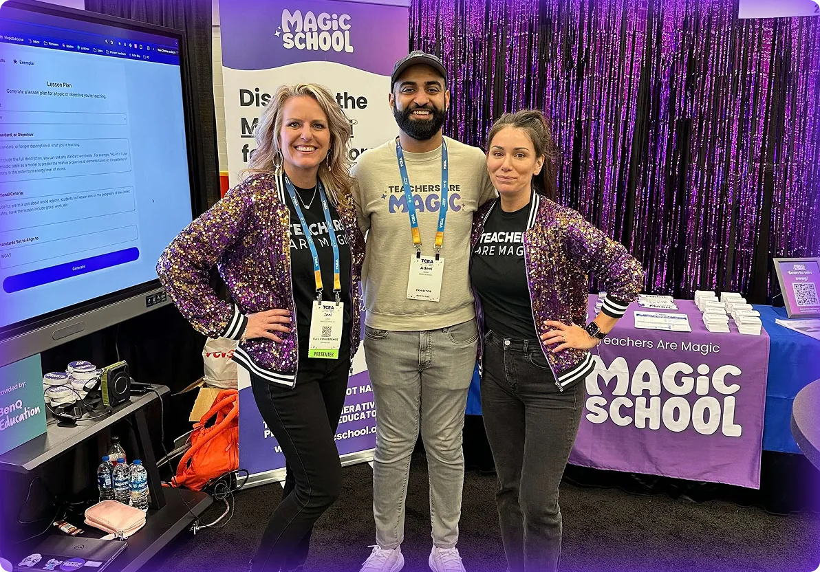 Photo of Adeel Khan, MagicSchool Founder & CEO, surrounded by 2 MagicSchool employees at a trade show