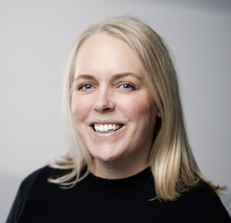 Photograph of Mallory Tuominen, Senior Manager of Professional Learning at MagicSchool AI, smiling against a neutral background.