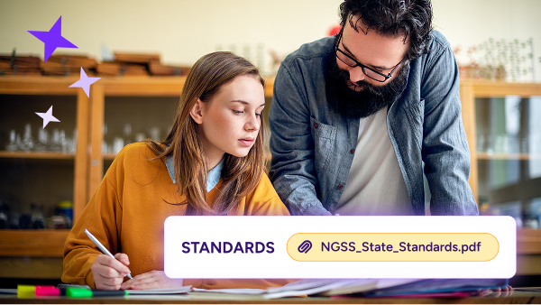 Teacher helping a student working at a desk, with NGSS State Standards overlaid.