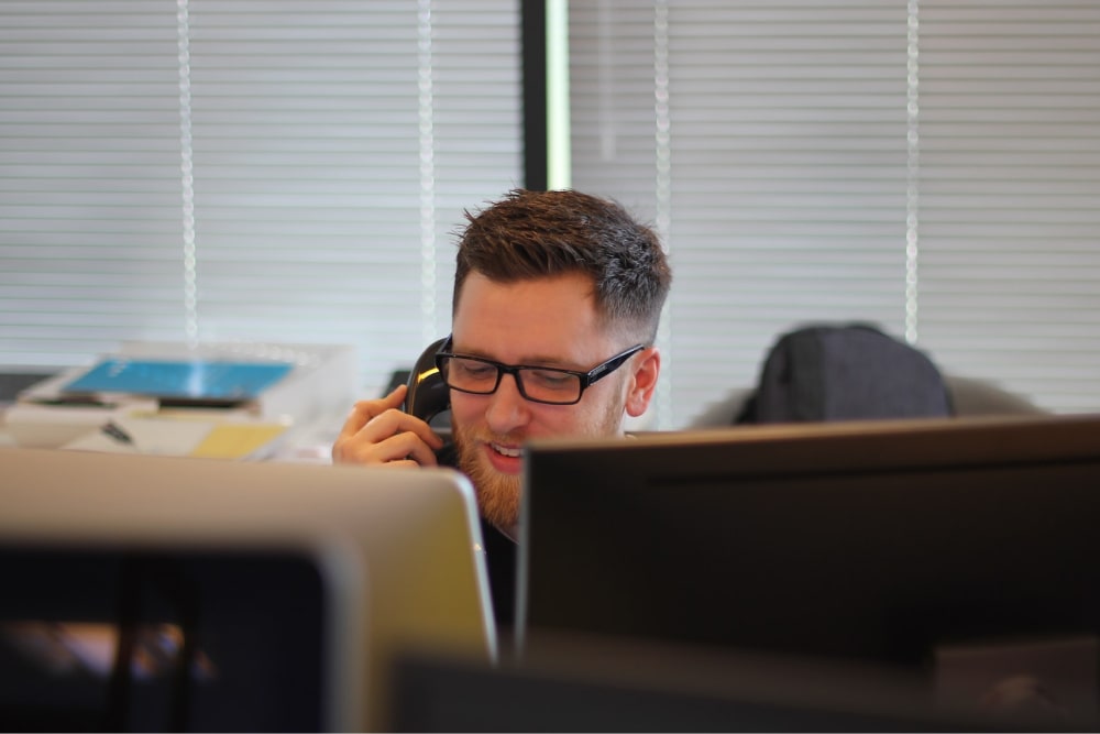 A man on the phone.