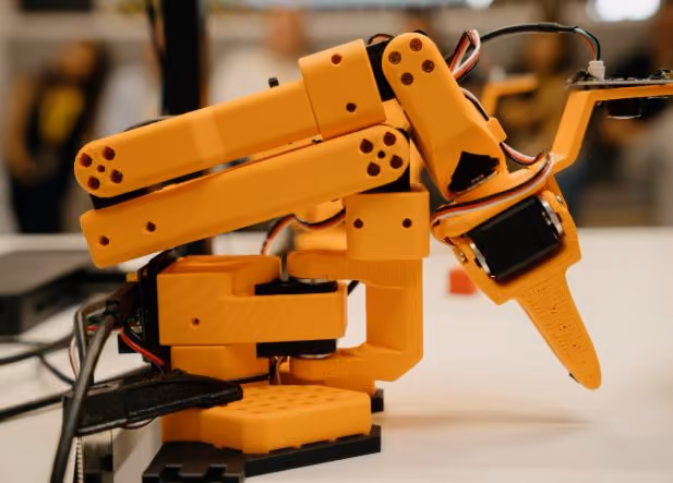 Orange robotic arm prototype