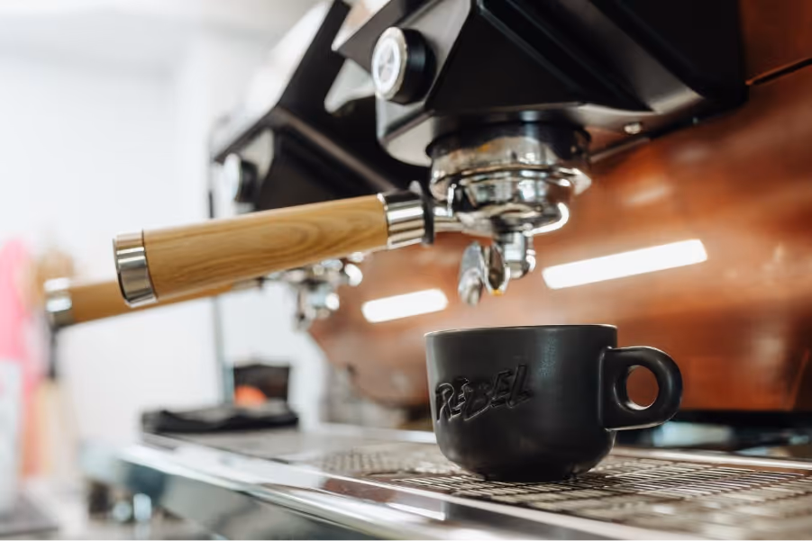 A close up of a coffee machineAI-generated content may be incorrect.