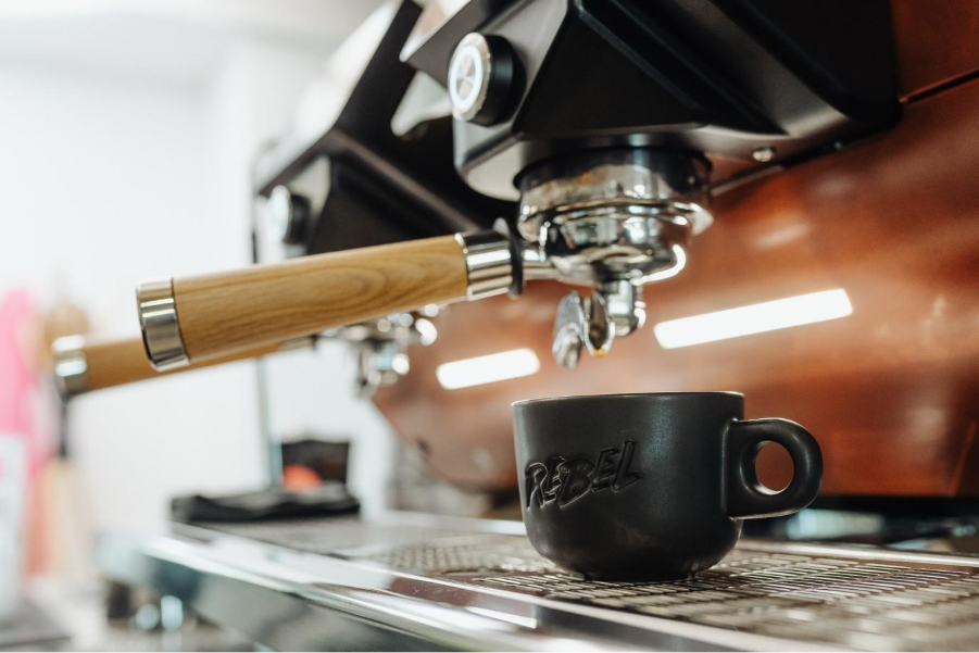 A close up of a coffee machineAI-generated content may be incorrect.