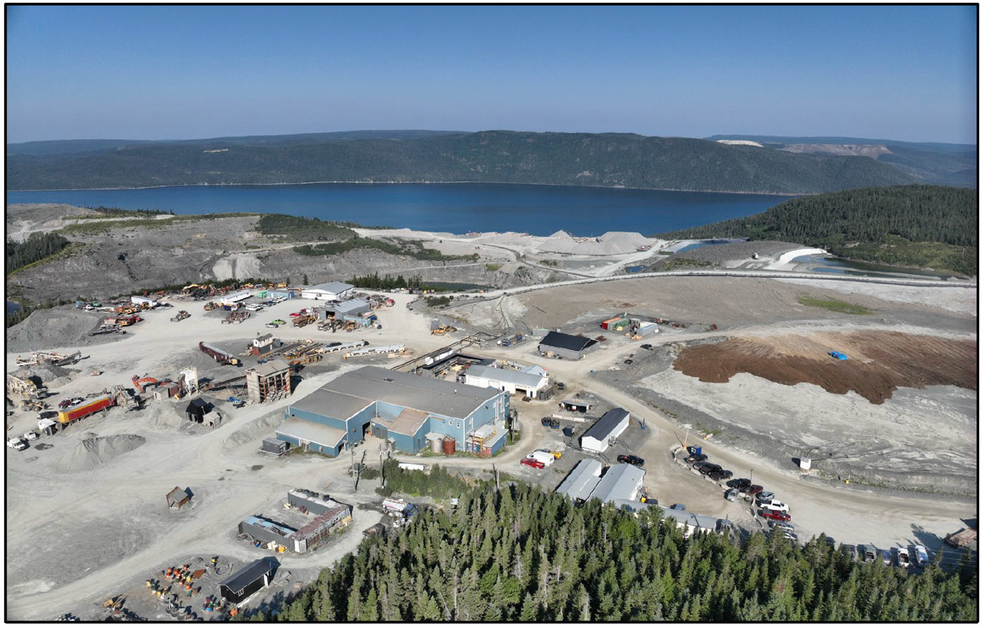 A large area with buildings and a body of waterAI-generated content may be incorrect.