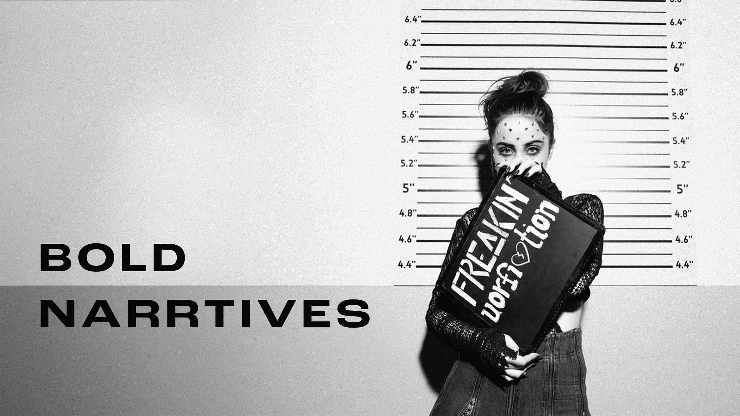 Black and white mugshot of a woman with heart stickers on her face holding a sign reading 'FREAKIN' worrfltion' in front of a height chart, with the text 'BOLD NARRTIVES' on the left.