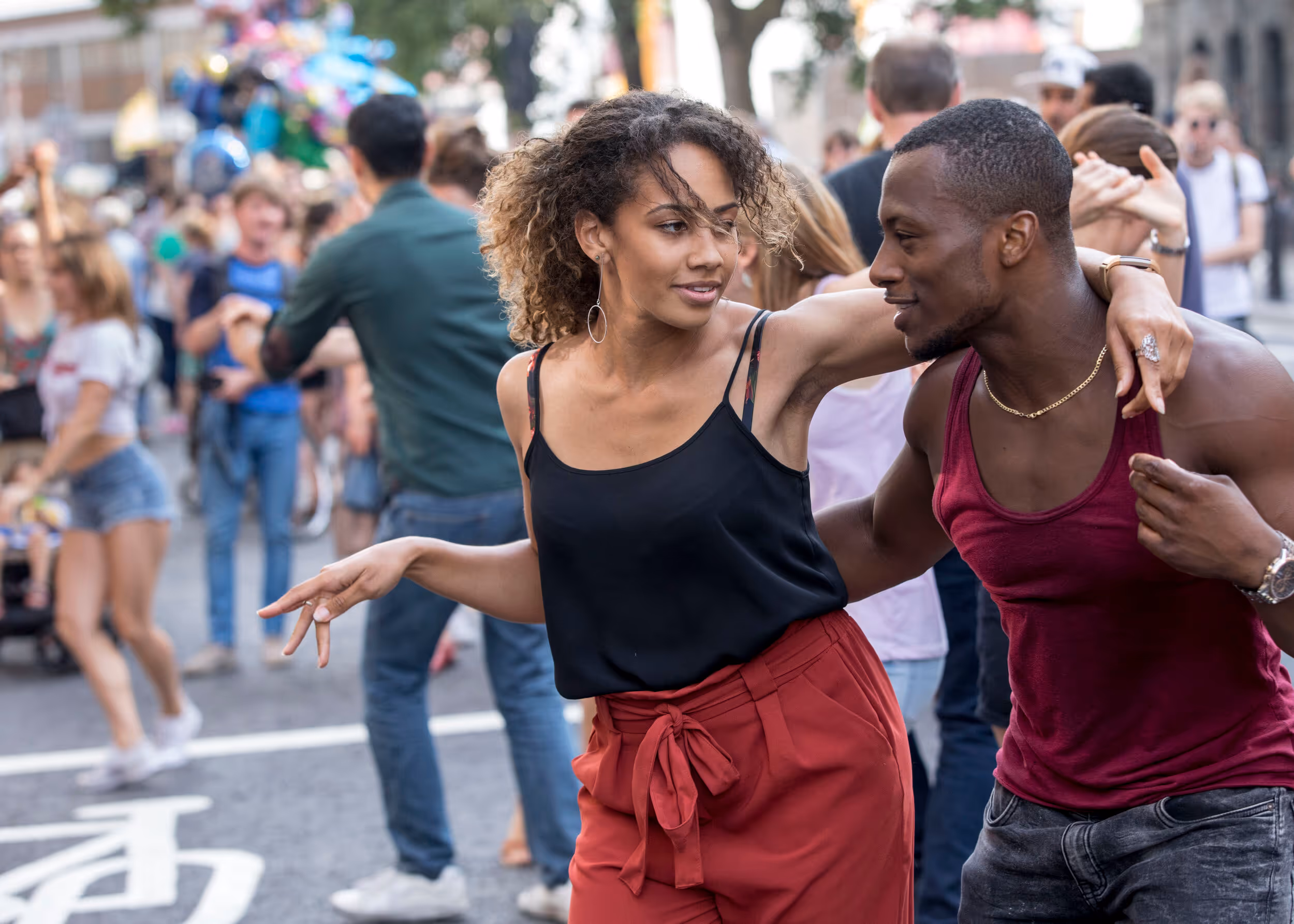 A couple dancing in the street