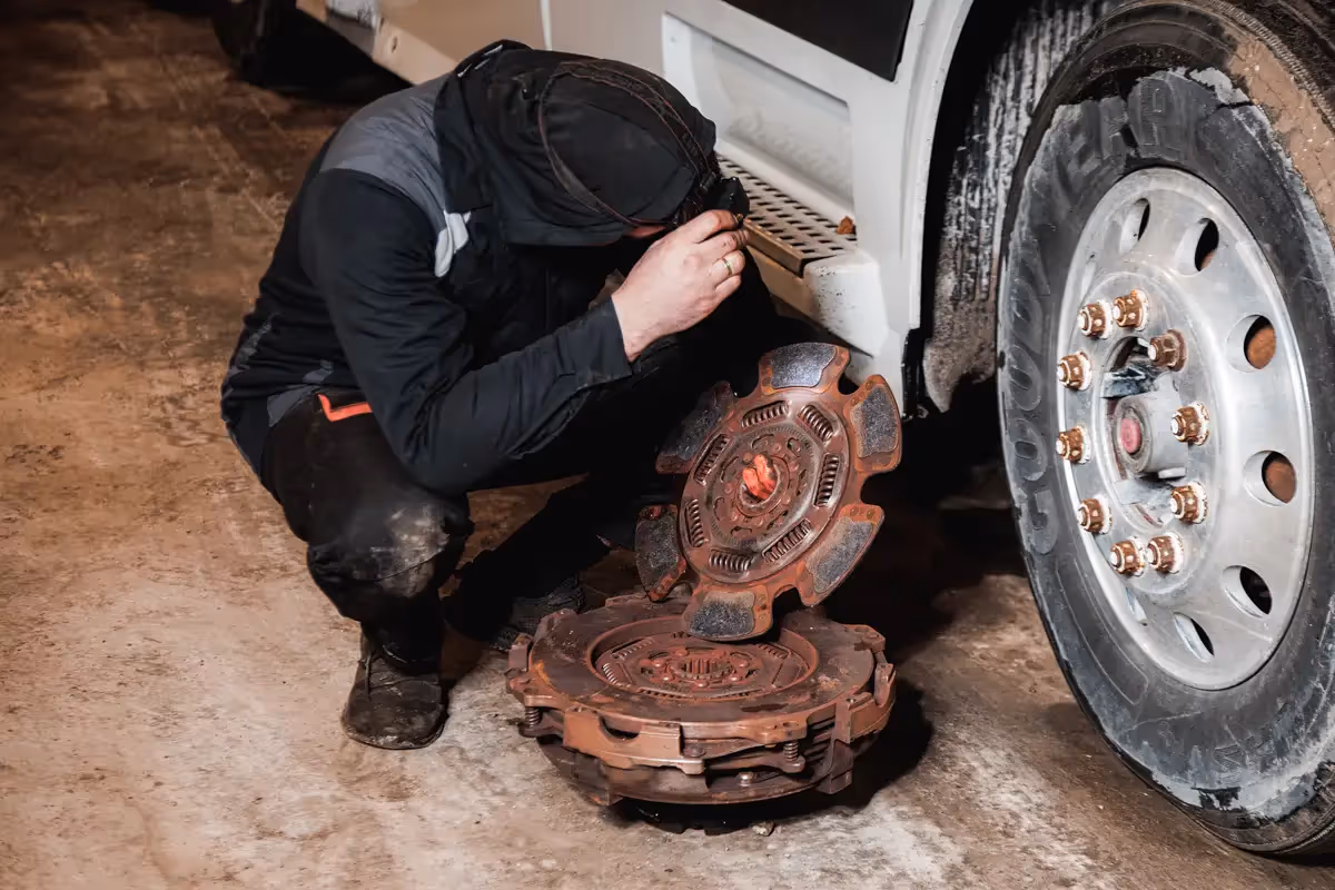 Diesel truck mechanic performing transmission repairs on semi truck in Belle Chasse, LA