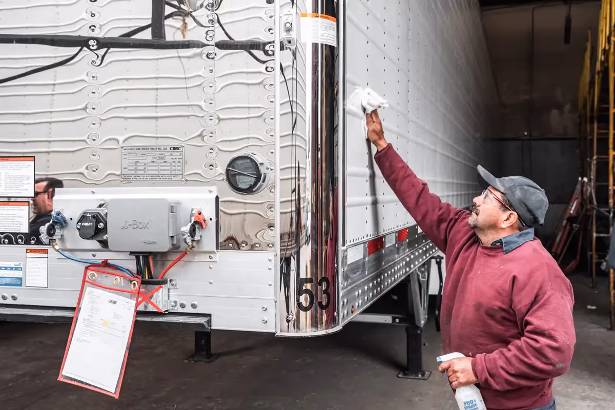 Diesel mechanic performing box truck repairs in Fontana, CA