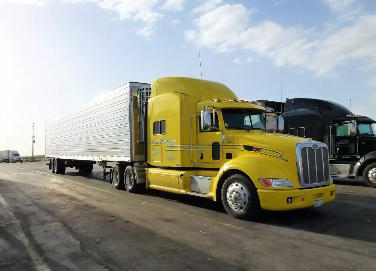 Heavy-duty semi-truck undergoing preventive fleet maintenance and inspection in Fontana, CA.