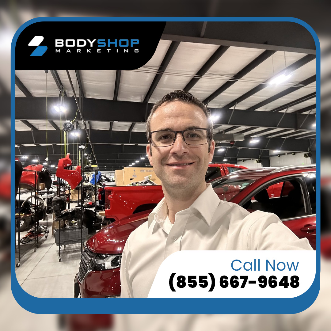 Portrait of a smiling man in a car repair shop with a 'Call Now (855) 667-9648' button.