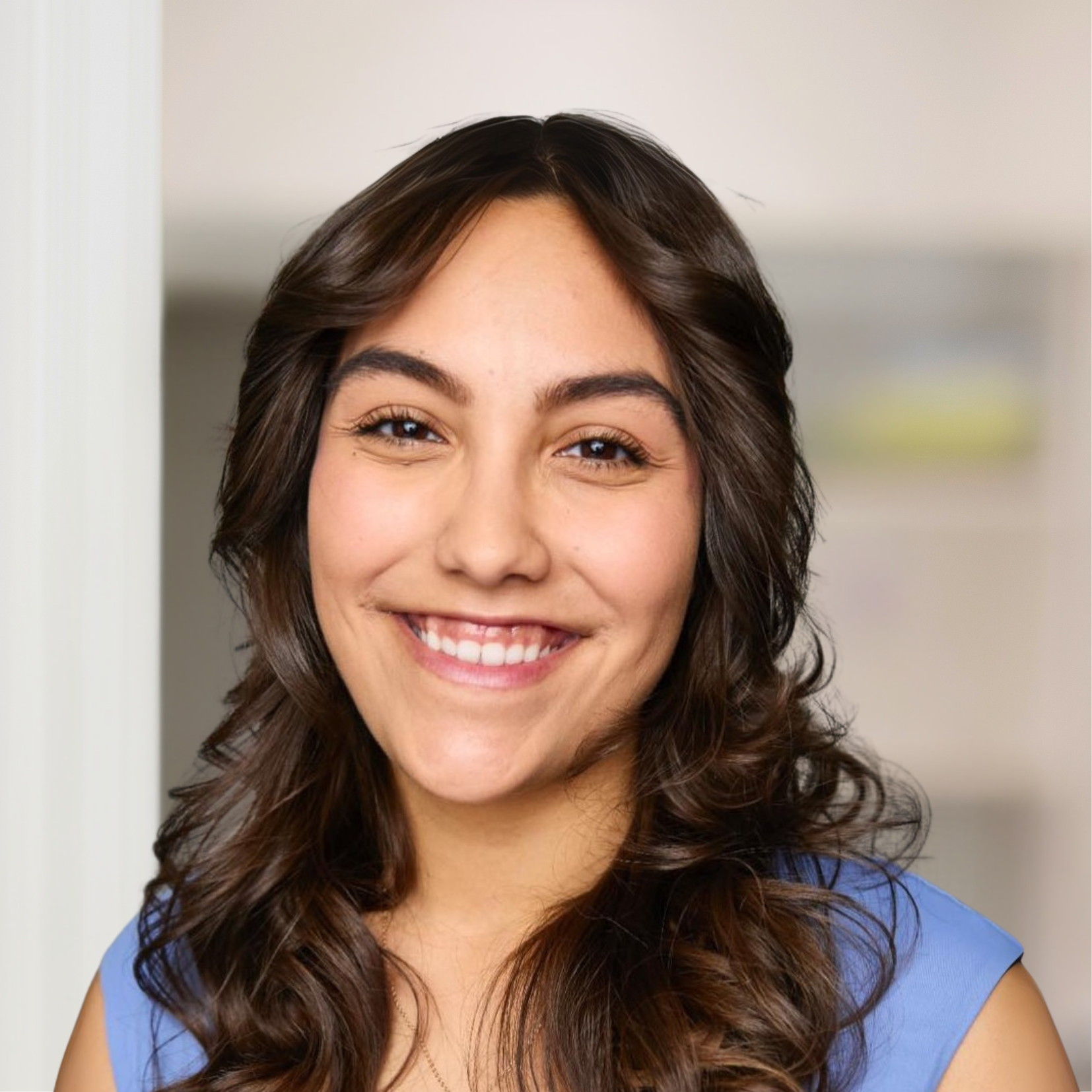 A smiling photo of Coach Vanessa
