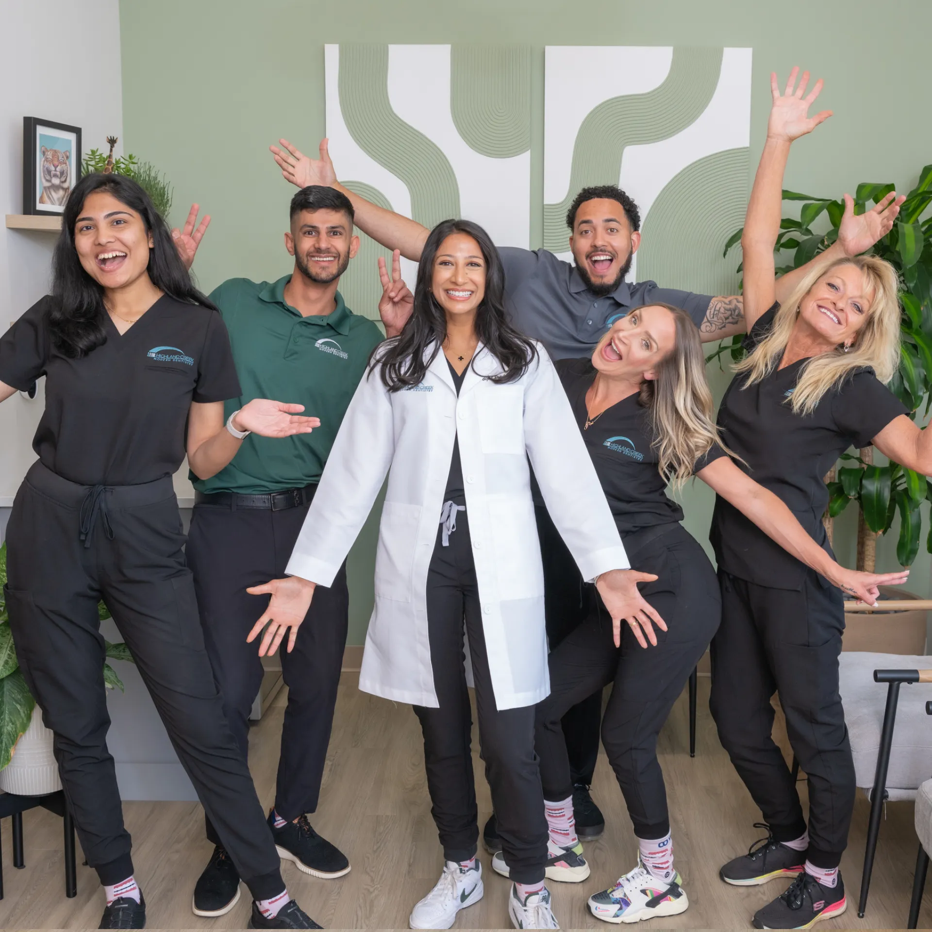 Higland Creek Modern Dentistry team celebrating