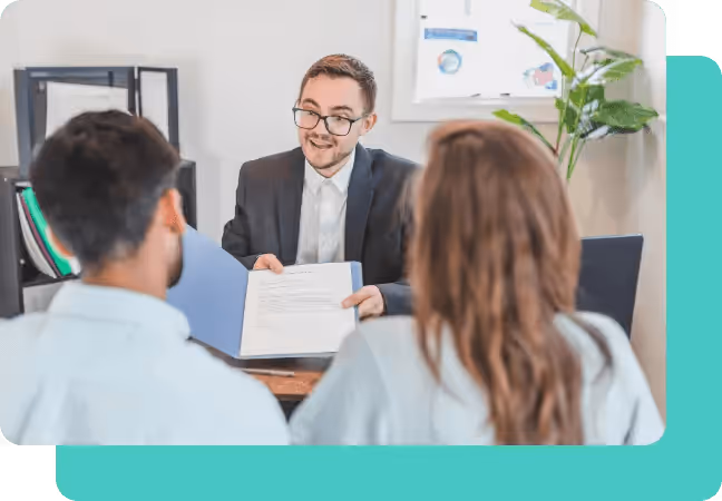 Couple talking to a professional who are helping them by consulting them with data