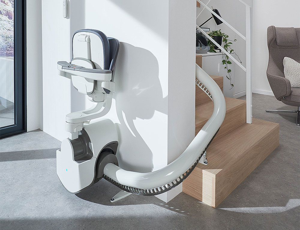 Flow X Curved Stairlift Seat Up