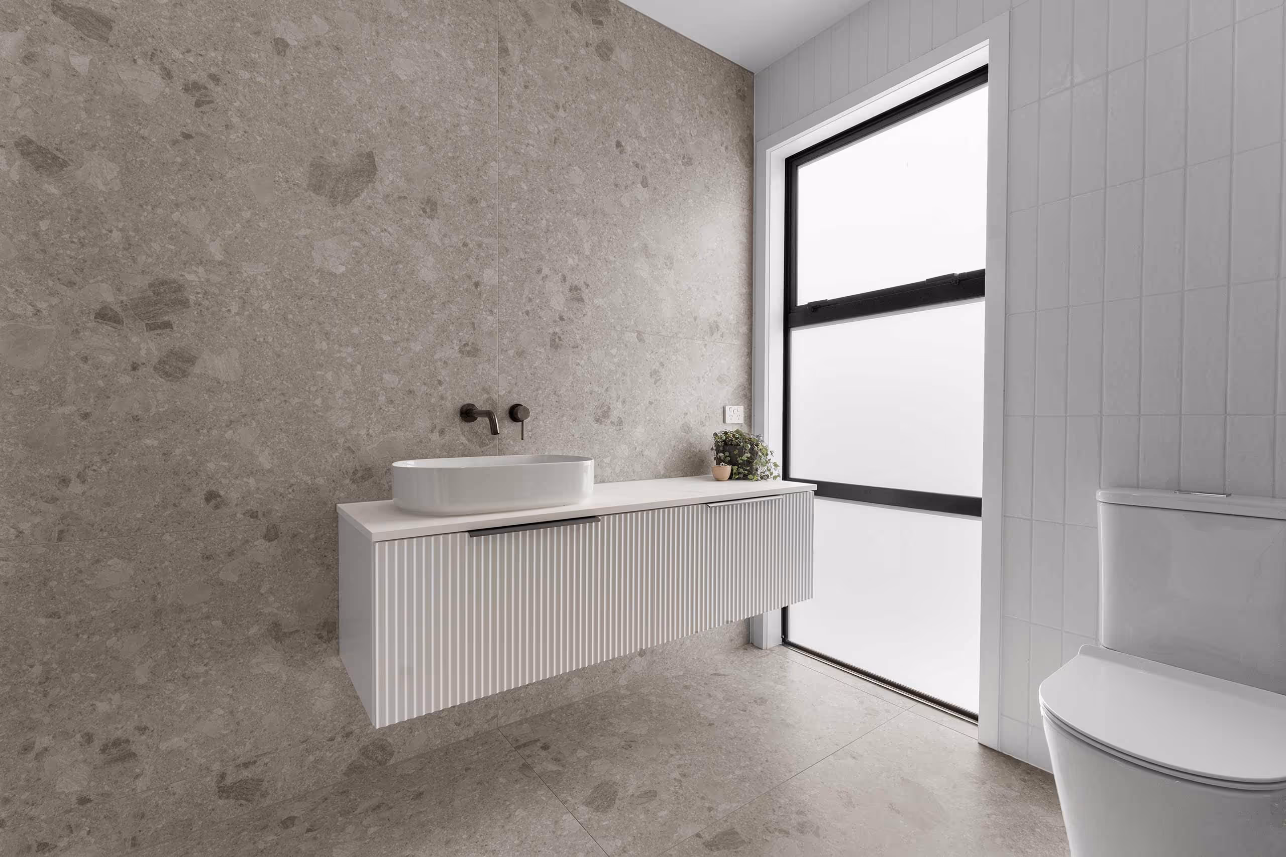 Tiled bathroom by Concept Tile Collective