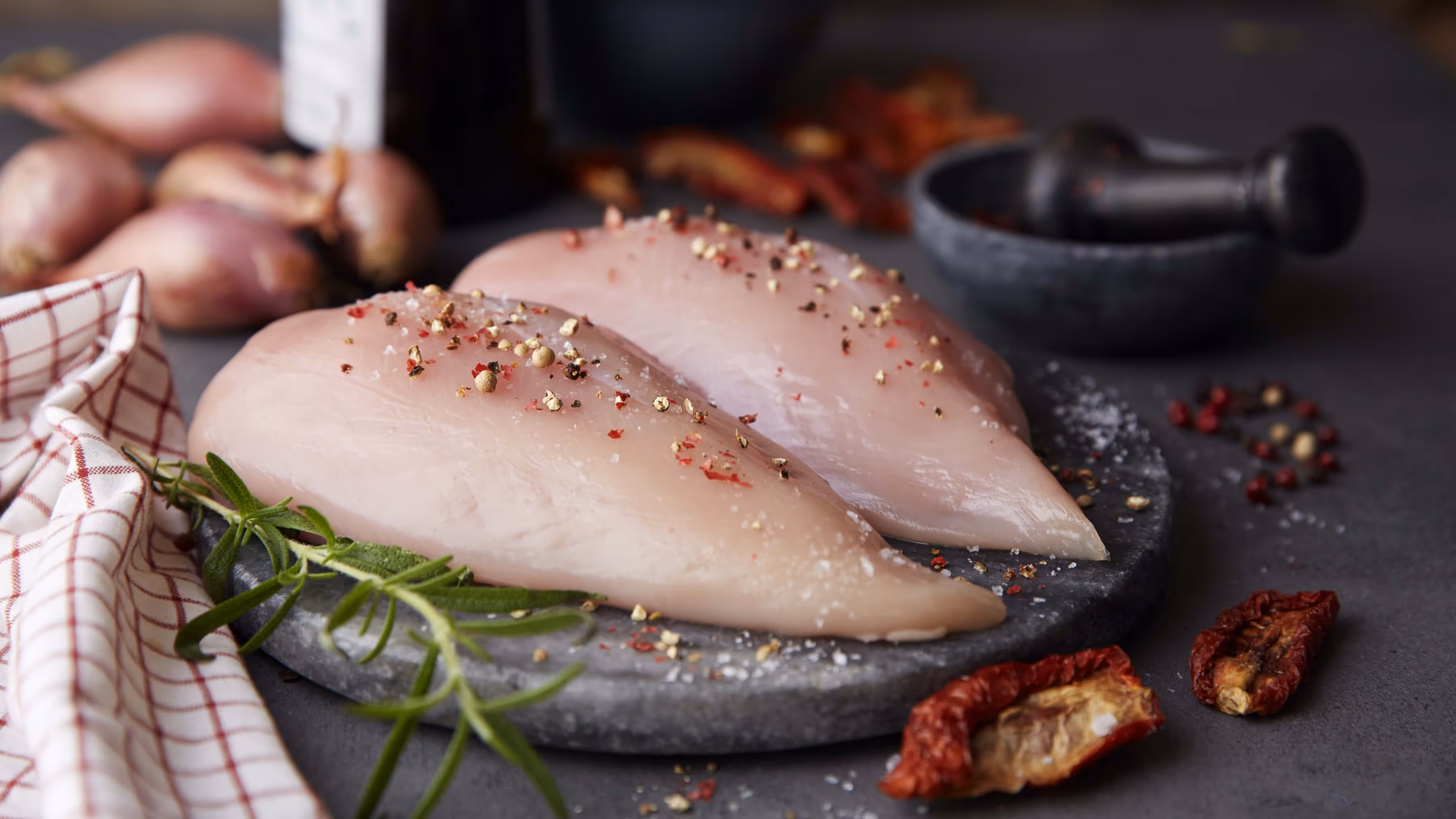 A closeup of raw chicken