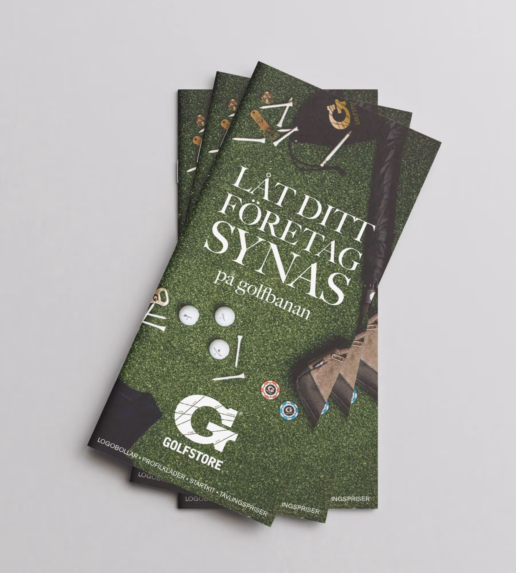 A stack of folders from Golfstore