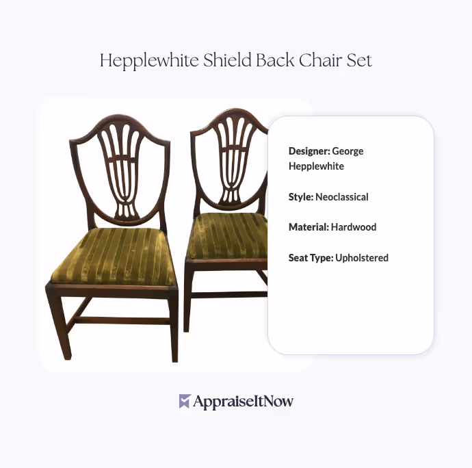 A set of four Hepplewhite shield back chairs with tapered legs and subtle decorative details