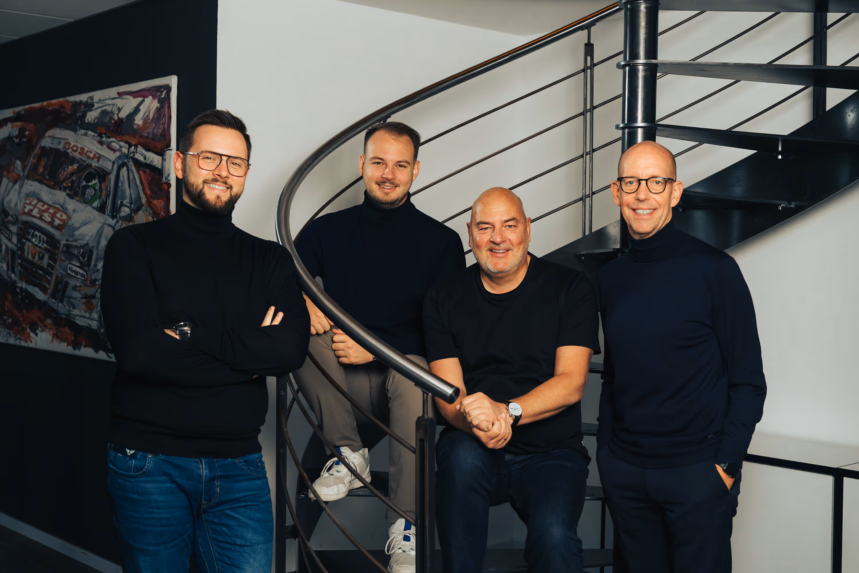 Gruppenbild des Boards. Von links nach rechts: Philipp Müller, Felix Müller, Stefan Müller und Tobias Franzke.