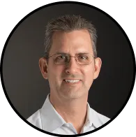 Man in glass and white shirt