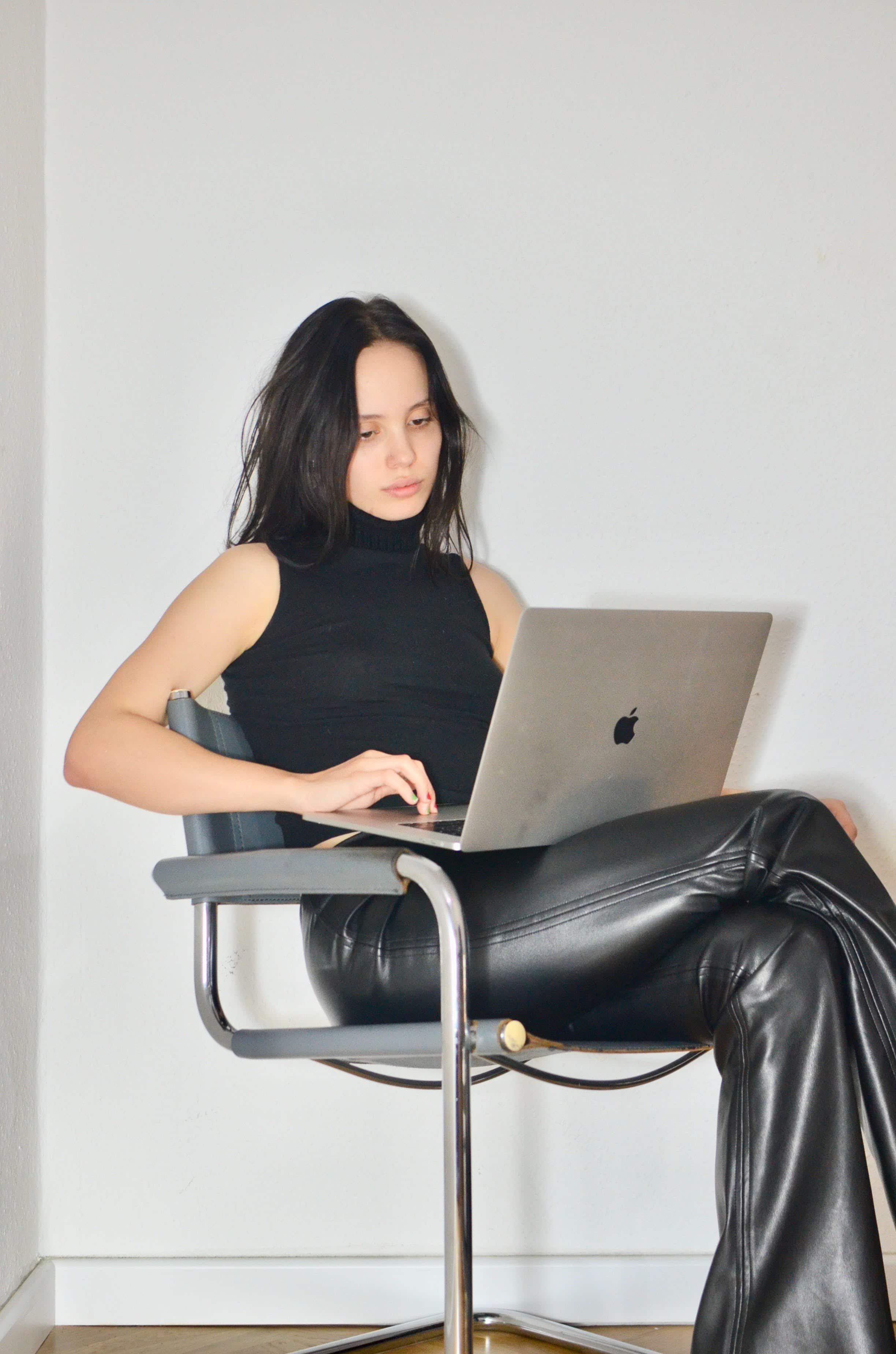 business woman ceo with laptop attending online workshop