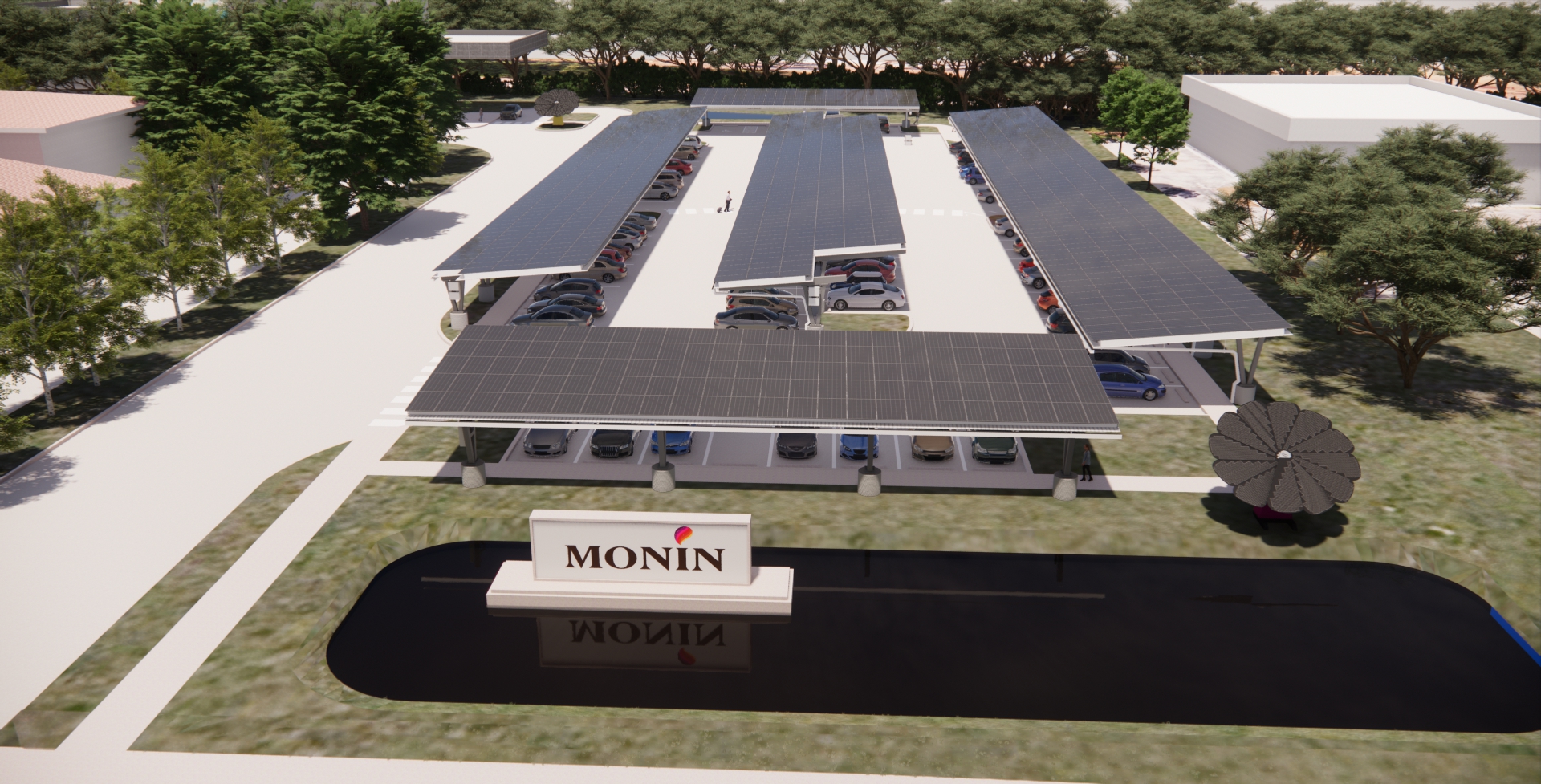 Solar panel-covered parking lot with a reflecting pond and MONIN signage.