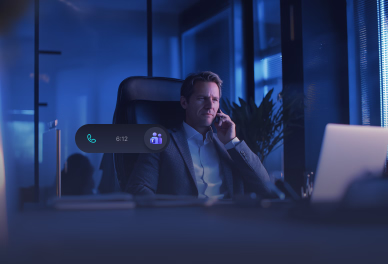 Man in business attire sitting in an office chair making a phone call, with Microsoft Teams call duration overlay showing 6 minutes 12 seconds.
