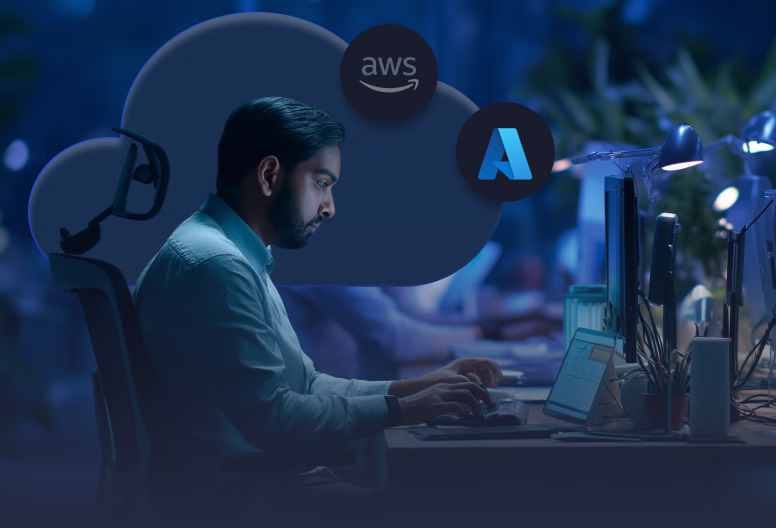 Man working late at a computer desk with cloud icons showing AWS and Microsoft Azure logos in the background.