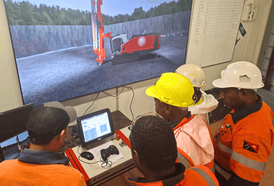 Drill rig operator training on a training simulator
