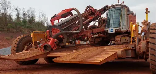 Sandvik DPi drill machine on Sleipner lowboy trailer in Ghana