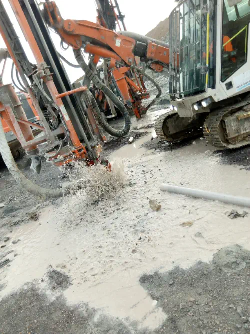 Sandvik DPi surface drill at Rocksure International's open pit mine in Ghana.