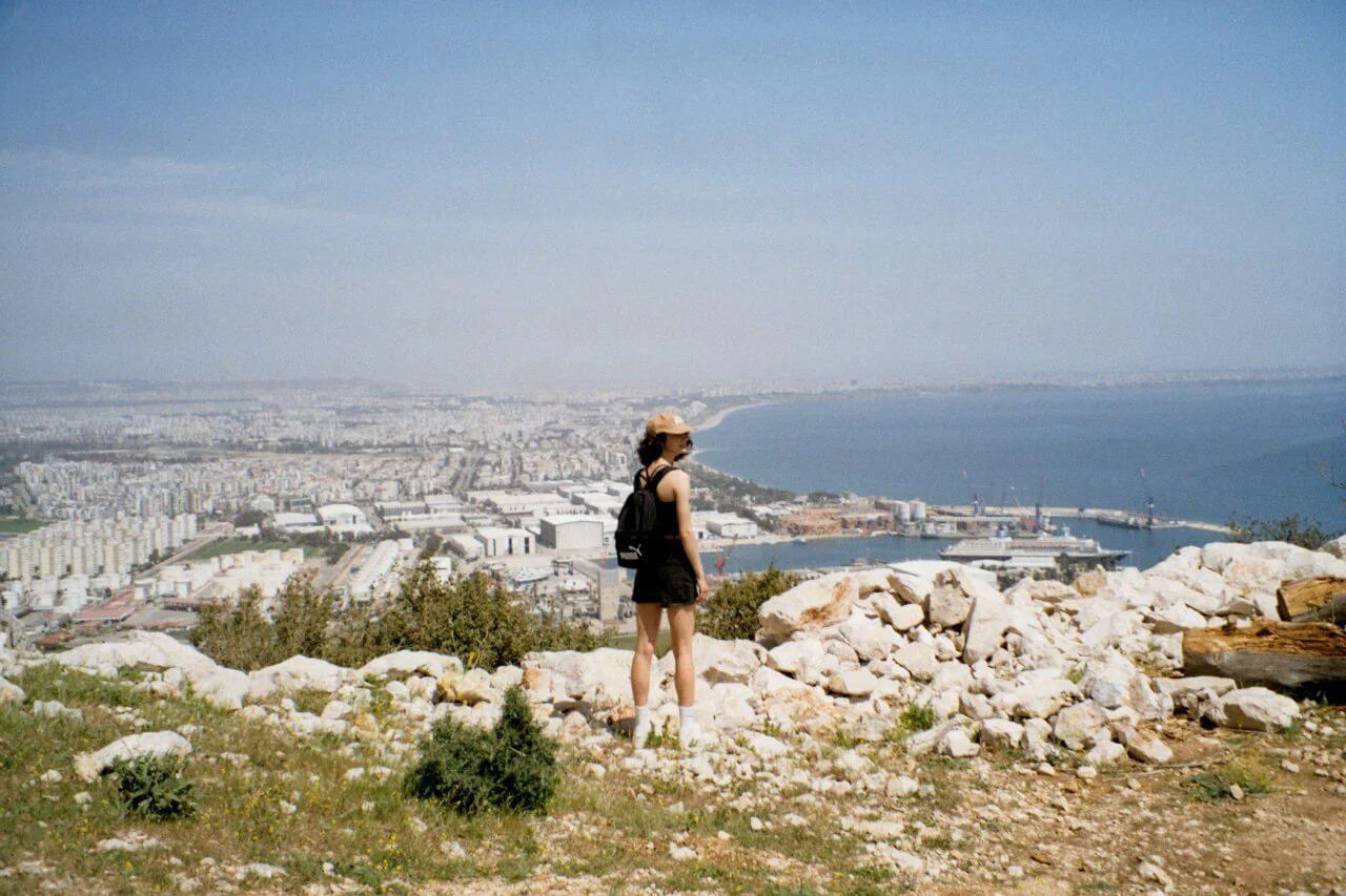 This is me, standing on a mountain and enjoying a beautiful sunny day and warm weather. 