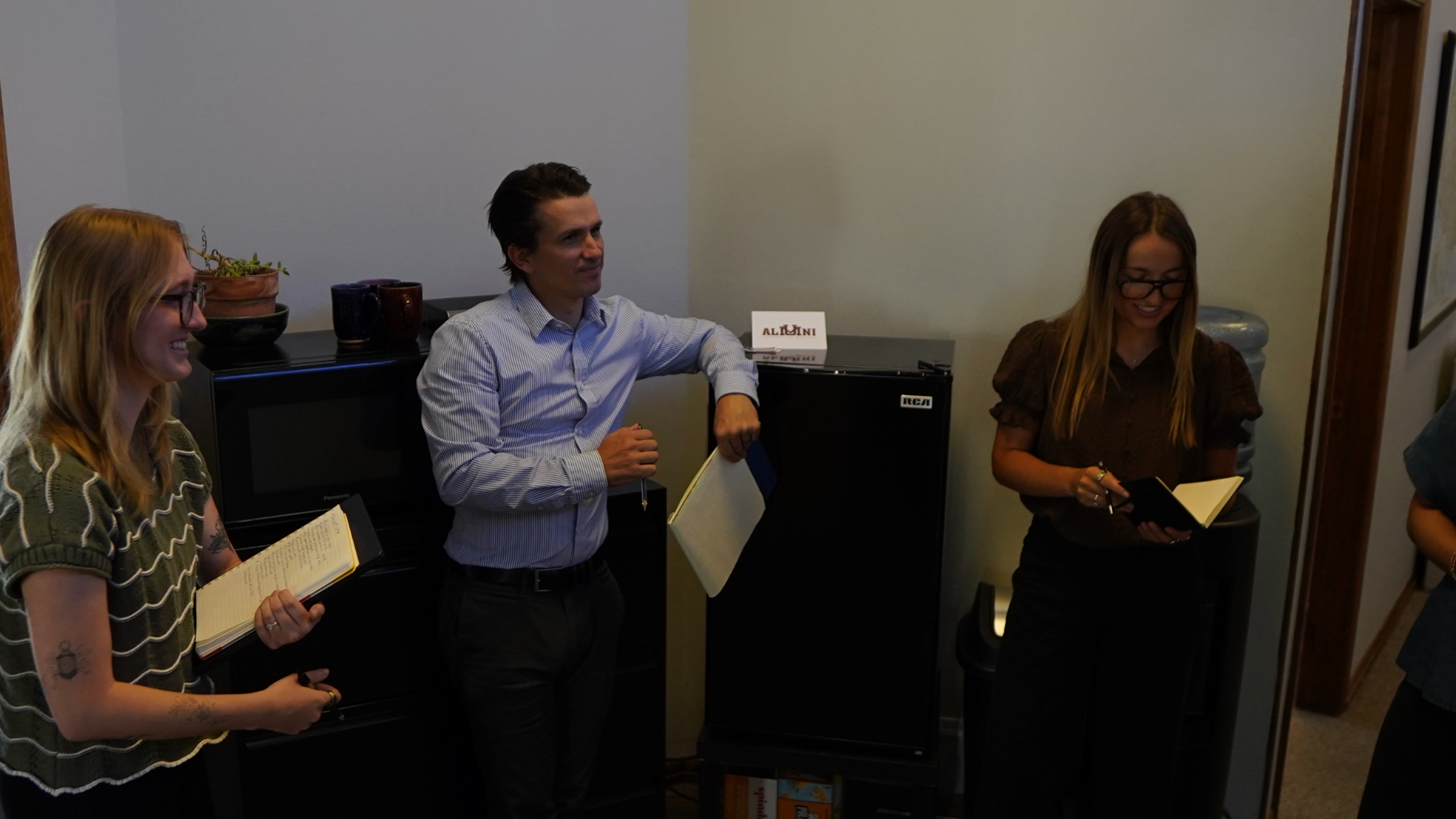 team chatting in the office