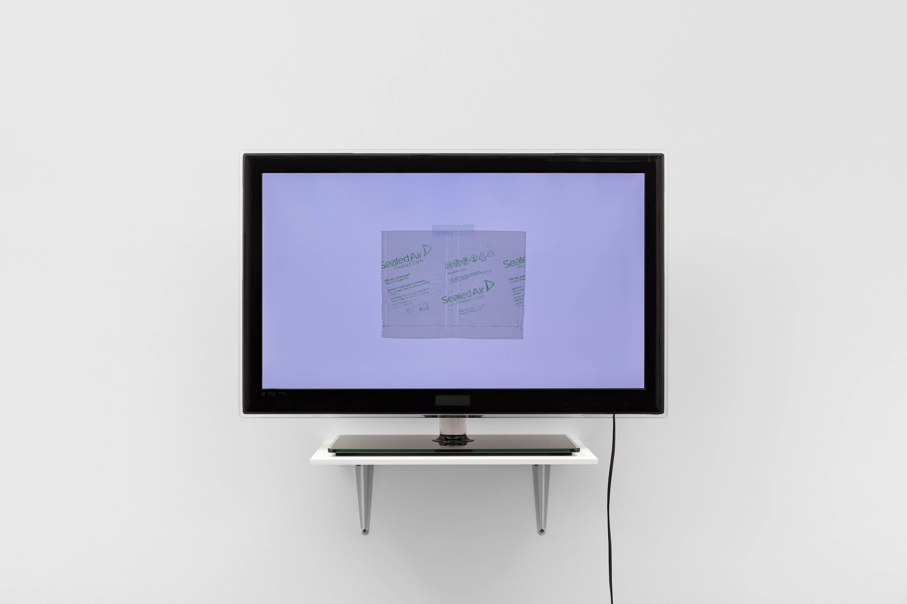 Eli Coplan, Sealed Air, 2022, LCD television, packing material, 55.2 x 78.6 x 24.2 cm, 21 3/4 x 31 x 9 1/2 in. Courtesy the artist and a. SQUIRE, London