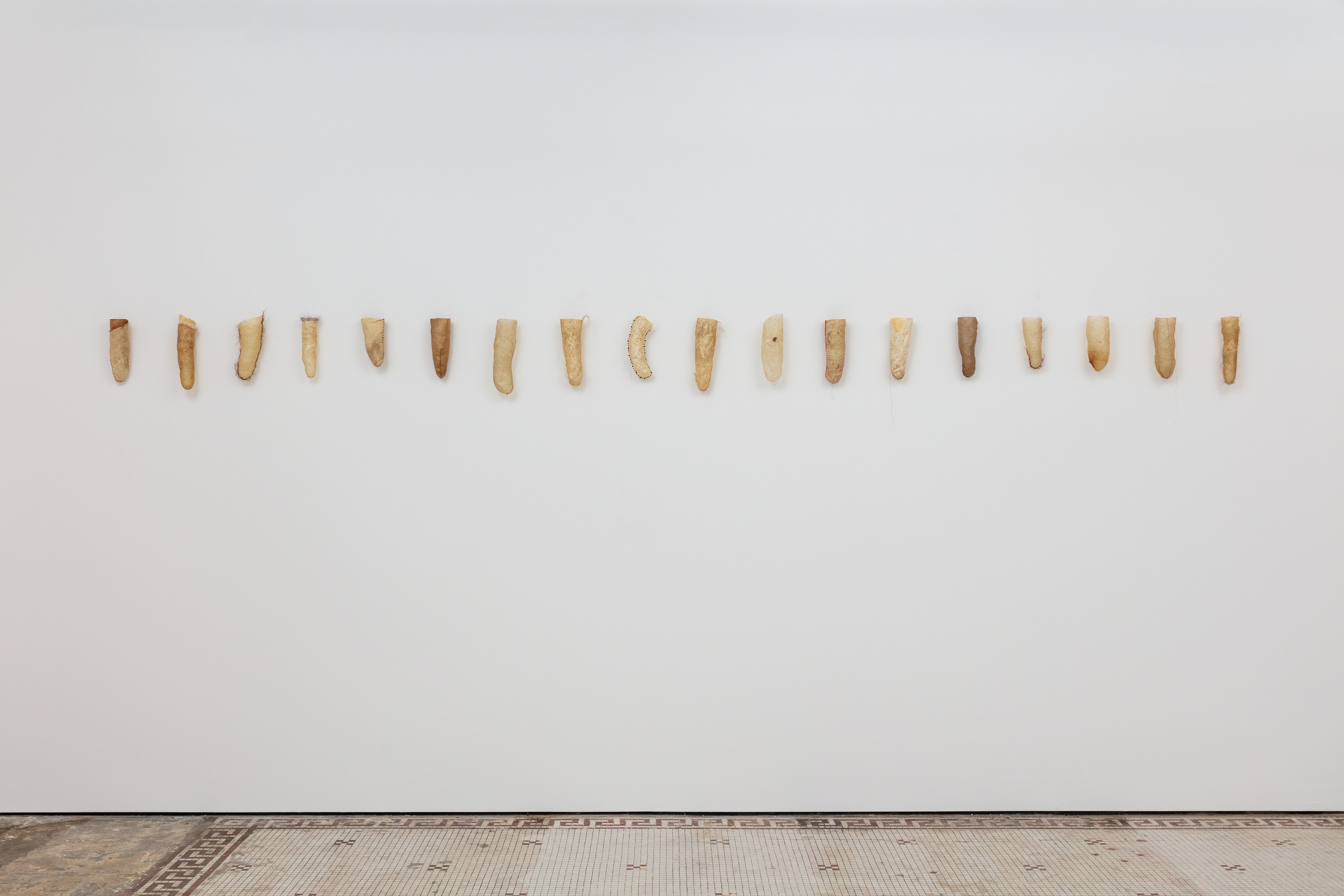 Large Secrets, 2012-2023, Walrus stomach, seal intestine, reindeer rawhide, sheep rawhide, glass bead, human hair, nylon thread, cotton string, beluga intestine, porcupine quill, Dimensions variable
