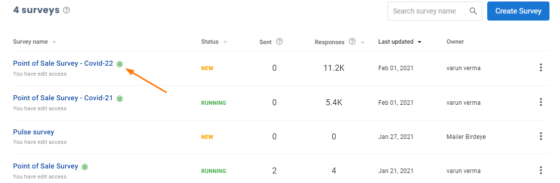 Survey dashboard listing four surveys with status, sent count, responses, last-updated date, owner, and a Create Survey button.