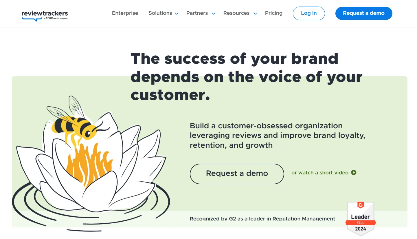 ReviewTrackers homepage with a customer-voice headline, loyalty and retention messaging, demo controls, and a G2 Leader badge.
