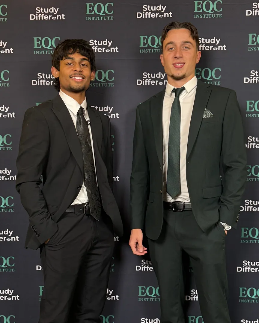 Two EQC Institute graduates at the graduation celebration