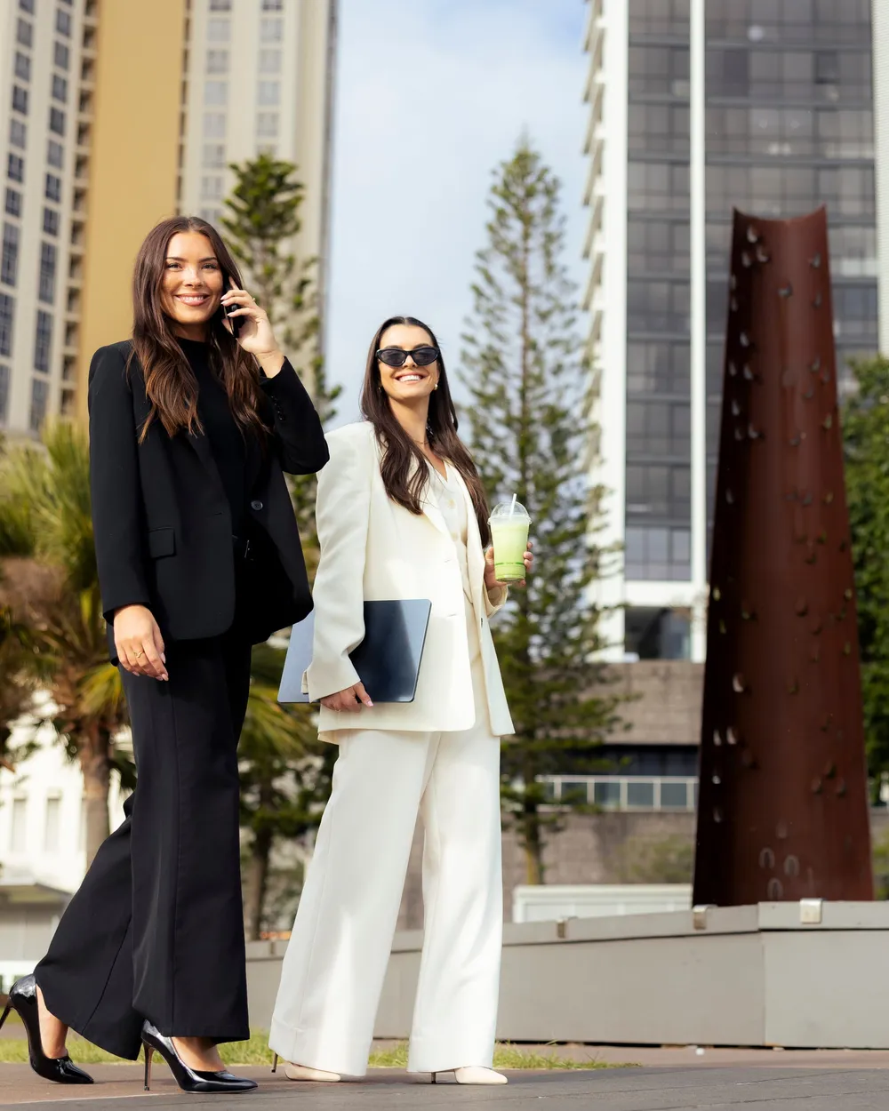 Two students walking through the Gold Coast city centre