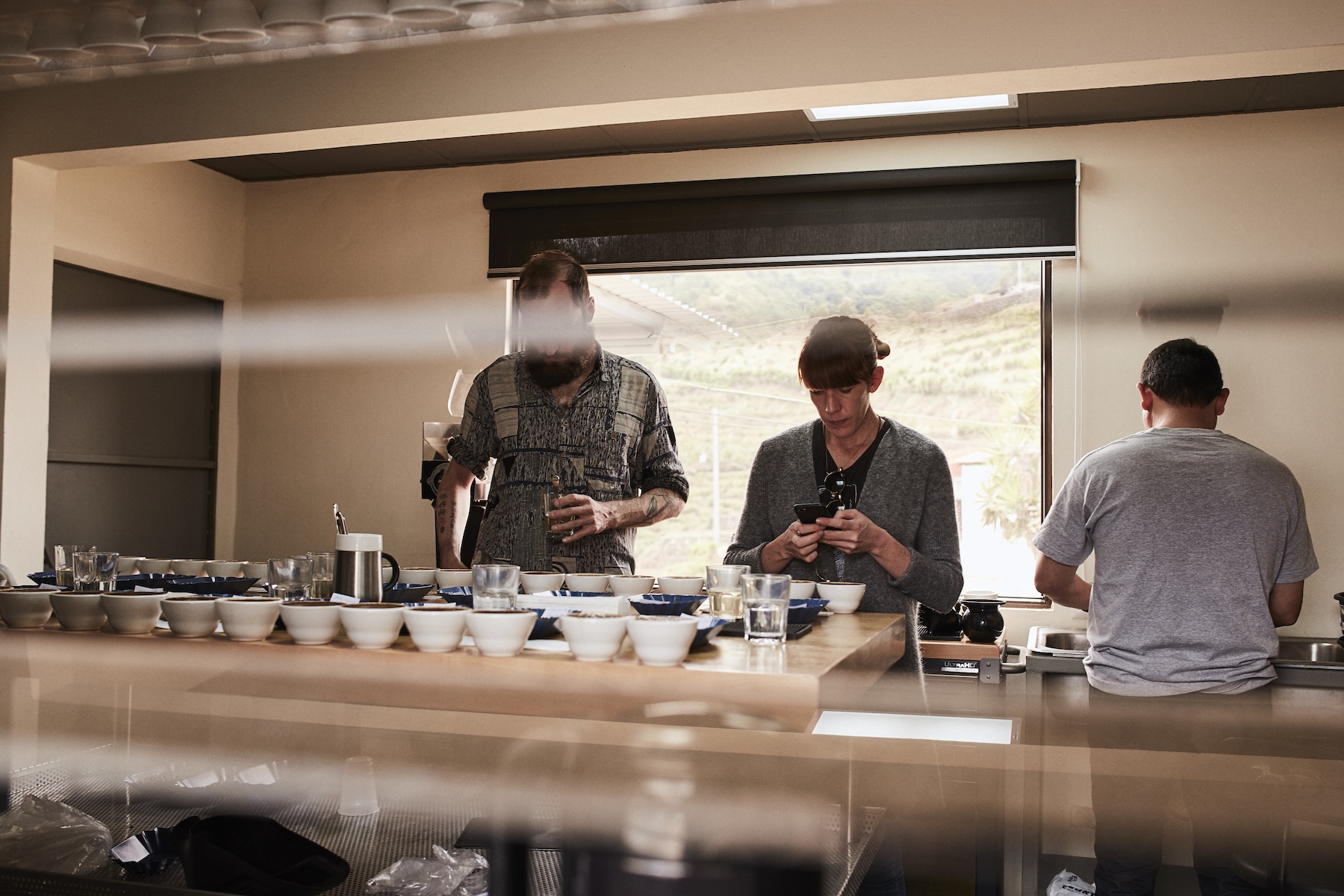 Our team at Nordic Approach cupping offer sample coffees at origin