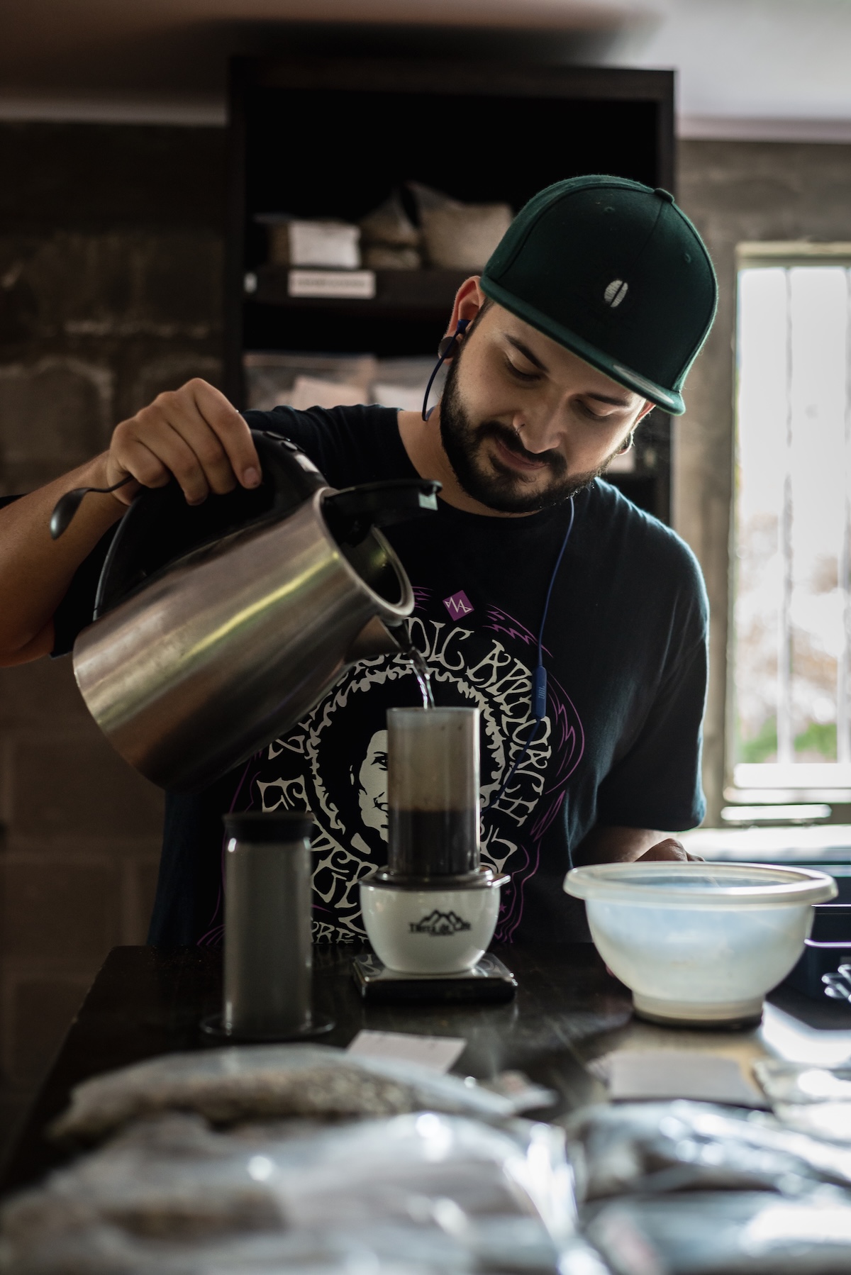 Juan (Enki) Suarez, Nordic Approach's Colombian green coffee buyer, cupping coffee at an origin session.